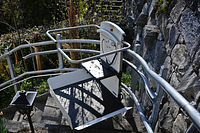 Inclined platform lift for outdoor use / curved stairs