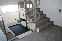 Platform lift inside curved